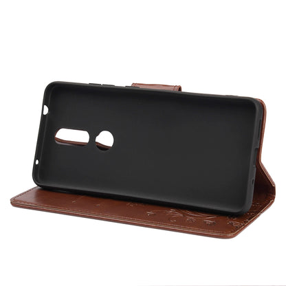 Imprint Butterflyand Flower Pattern Leather Wallet Phone Shell for Nokia 2.4